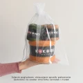 sposób pakowania zestawów na sweter charlotte.webp