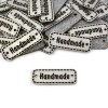 Zestaw metek ekoskóra metalizowana "Handmade" / srebro / 11 x 30 mm / 5 szt.