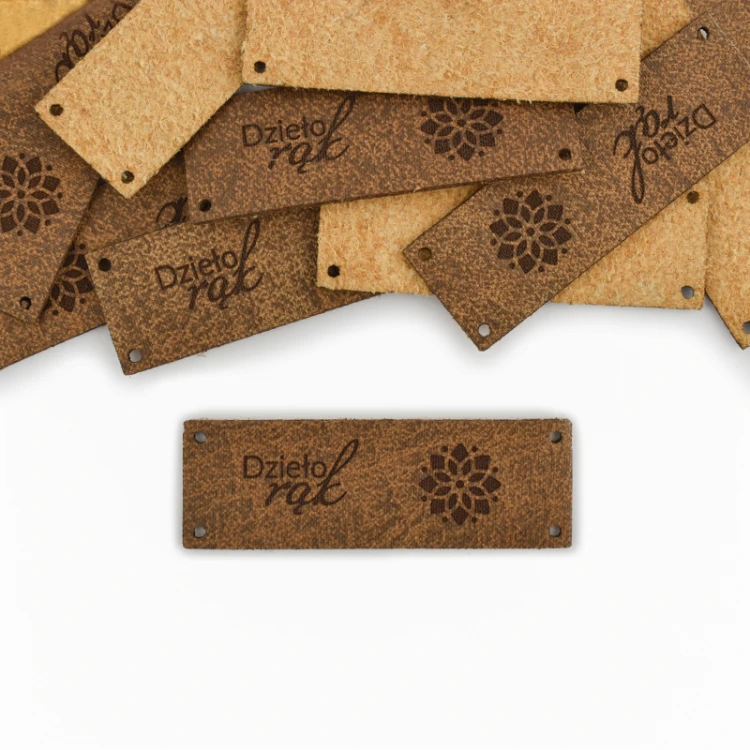 Metka skóra naturalna premium "Dzieło rąk" / kwiat lotosu / brąz / 60 x 20 mm / 1 szt.