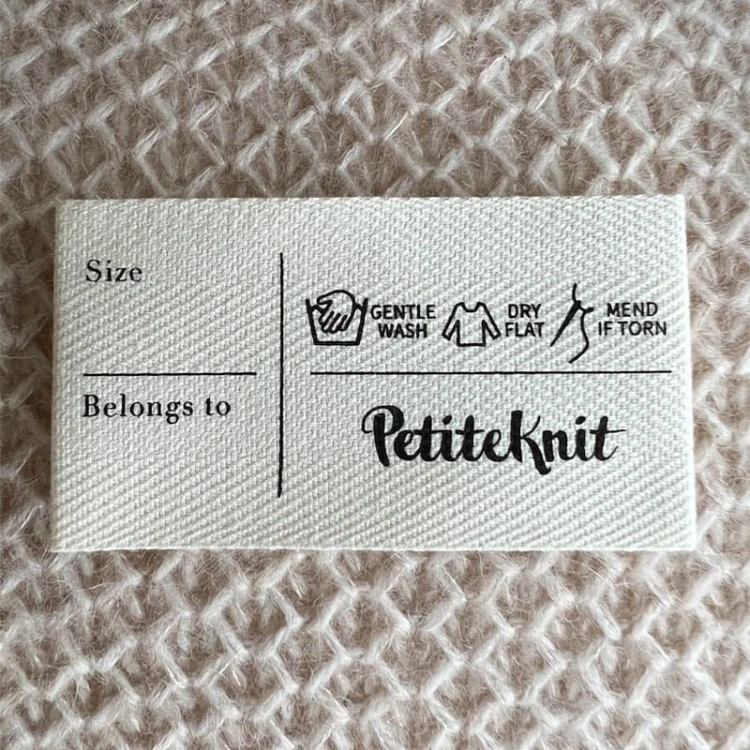 Metka tkana PetiteKnit "Care label" - instrukcja prania / naturalny /  7,5 x 4 cm / 1 szt