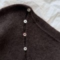 Guzik PetiteKnit okrągły / masa perłowa / 11,4 mm / 12 szt