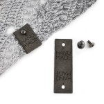 Metka nubuk premium z nitem "HAND MADE" / ciemny szary / 60 x 20 mm / 1 szt.