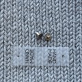 Metka silikonowa z nitem "HAND MADE" / czerń / 60 x 20 mm / 1 szt.