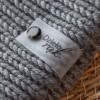 Metka silikonowa z nitem "Dzieło rąk" / serce / czerń / 65 x 20 mm / 1 szt.